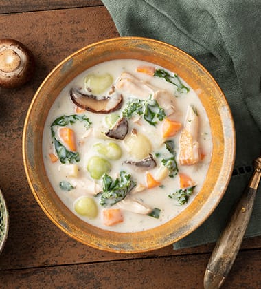 Image of crimini mushroom, chicken & root vegetable soup made with campbell’s® healthy request® cream of mush
