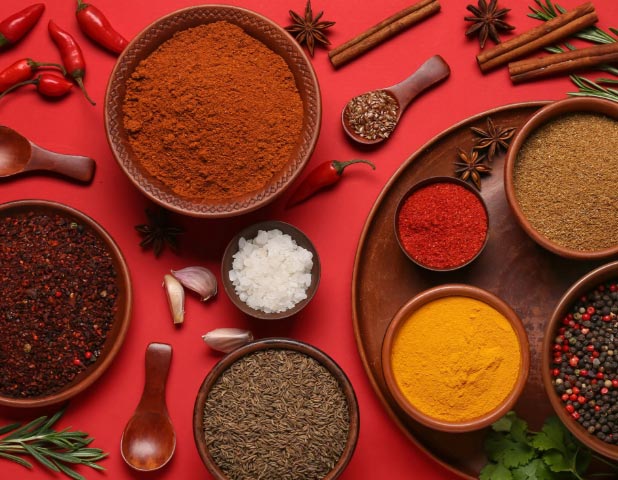 vibrant spices on a red background