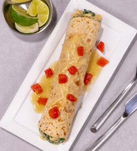 CHICKEN AND WHITE BEAN ENCHILADAS MADE WITH CAMPBELL’S® HEALTHY REQUEST® CREAM OF CHICKEN SOUP